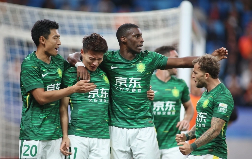 包含北京国安在客场战平广州富力，保持不败的词条